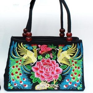 New embroidered floral peacock handbag